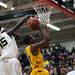 Ypsilanti junior Jaylen Johnson is blocked by Saginaw High Keyon Addison on Tuesday, March 19. Daniel Brenner I AnnArbor.com